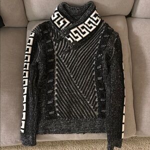 Black and White Turtleneck Sweater with Geometric Pattern and Textured Knit